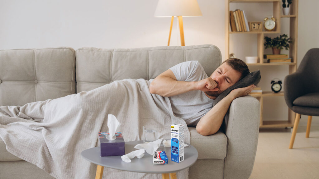 Hombre recostado en un sofá, con productos Agrifen sobre la mesa.